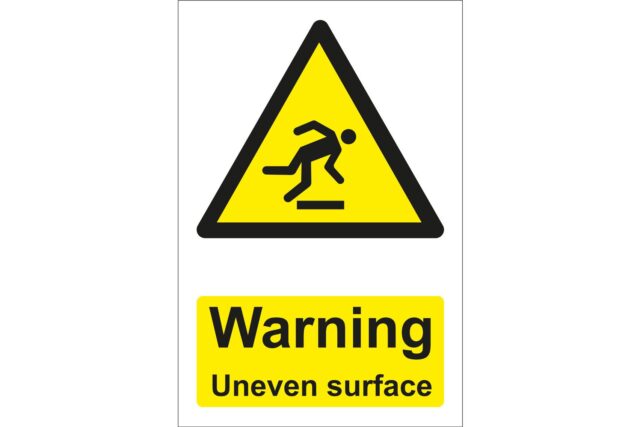 Warning Uneven Surface Sign
